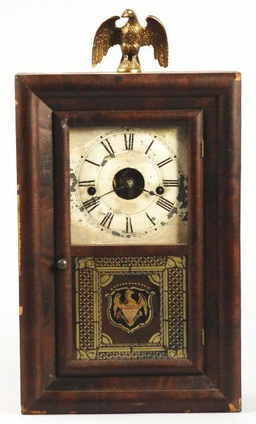 Time & Strike Shelf Clock.: By Seth Thomas. Reverse painted eagle on bottom panel. Pendulum and key. Some paint loss to dial. Size: 19 - 3/4" x 10 - 3/4".