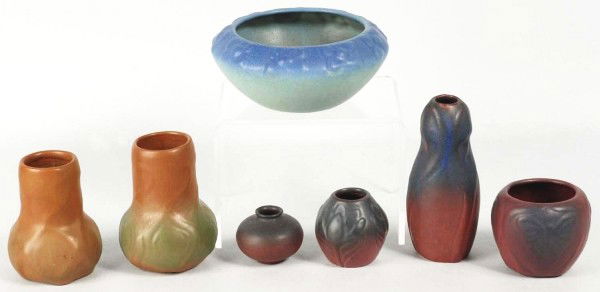 Lot of 7: Vintage Van Briggle Pottery Vases.: Includes two similar Mountain Craig Brown (one with defined green highlights), four pieces in mulberry and dark blue, and one bowl form floral decorated vase with one hairline crack. Size: Largest: 6