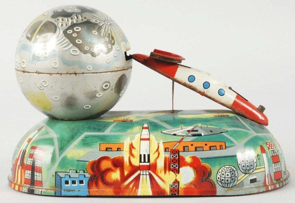 Tin Litho Missile Savings Mechanical Bank.: Japanese. 1950s. Unknown maker. Great lithography. Size:4 - 3/4" T.