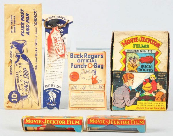 Lot of 5: Vintage Buck Rogers Items.: Includes one original envelope for the Official Punch O Bag, one Morton's Salt cardboard space ship in envelope, series no. 115 Buck Rogers Movie-Jector films with very nice colorful box, and two extr