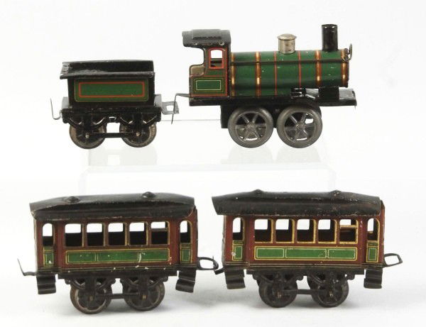 Tin Litho Karl Bub Wind-Up Train Set.: German. O-gauge. Mechanism is not working. Includes steam type engine, coal tender, and two passenger cars. Some minor scratching throughout. Size: