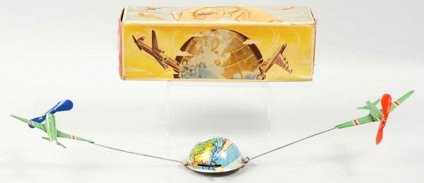 Tin Litho Airplane Wind-Up Toy.: German. Working. Lever operated. Toy consists of tin base and two airplanes which revolve around it. Very little wear overall. Includes original box marked "Made in Western Germany" and instruction sh
