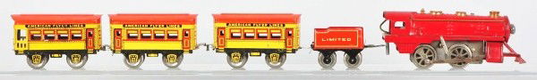 American Flyer Lithographed Wind-Up Passenger Set: Description American. Pre-war. O-gauge. Includes wind-up red locomotive, lithographed red Limited tender with battery compartment, and three four-wheel red and yellow American Flyer Lines passenger ca