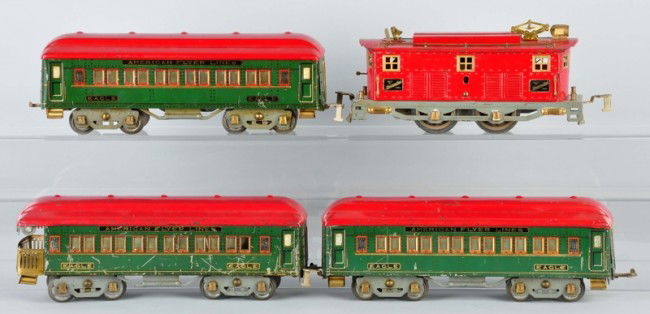 American Flyer Eagle Passenger Train Set.: Description American. Pre-war. Standard gauge. Hard-to-find set consists of a red box cab-style locomotive and two red and green Eagle litho-sided passenger cars. Cars show scratching and play wear th