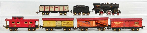 Ives No. 1120 Freight Train Set.: Description American. O-gauge. Cast iron electric 4-4-0 steam profile engine, tin New York Central tender, and five lithographed freight cars. Freight cars include no. 127 live stock boxcar, no. 125 U