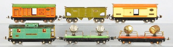 Lot of 6: Tinplate Lionel 800 Series Freight Cars: Description American. Pre-war. O-gauge. Includes two no. 820 searchlight cars, no. 813 cattle car, no. 814 boxcar, no. 816 hopper car, and no. 817 caboose. Cars have scratching and wear throughout, ca