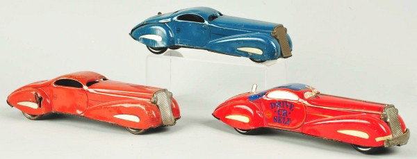 Lot of 3: Tin Litho Marx Automobile Wind-Up Toys.: Description American. Working. Includes two color variations of the reversible coupe and one Drive Ur Self. All three have some scratching and wear and denting to roofs on reversible coupes. Condition