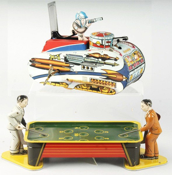 Lot of 2: Tin Litho Wind-Up Toys.: Description American. Working. Includes one Ranger Steel Pool Players toy missing balls and one Rex Mars Planet Patrol Space Tank X-1 toy. When in operation, space man with gun pops in and out of rear