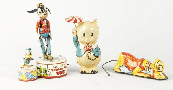 Lot of 3: Tin Marx Comic Character Wind-Up Toys.: Description American. Working. Includes one Porky Pig with umbrella marked "1939 Leon Schlesinger" on rear, one Rollover Pluto with one replacement ear and one missing ear, and one Donald Duck Duet ma