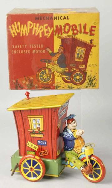 Tin Litho Wyandotte Humphrey Mobile Wind-Up Toy.: Description American. Working. All original including plastic stack. Very little wear overall. Includes complete and colorful original box. Condition (Excellent). Size 8 - 1/2" L. Dimensions:8 - 1/2" 