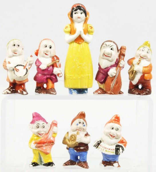 Set of Bisque Snow White & the 7 Dwarfs Figures.: Description Japanese. Pre-war. Marked "Walt Disney" on back of figures. Very nice set with some chipping, wear, and paint loss to feet. Happy has one foot broken off. Condition (Very Good). Size Large