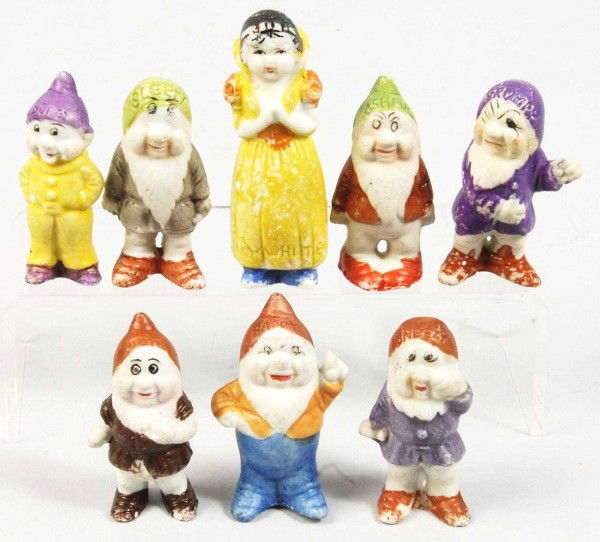 Set of Bisque Snow White & the 7 Dwarfs Figures.: Description Japanese. Pre-war. Marked "Walt Disney" on back of figures. Some overall wear throughout. Condition (Very Good). Size Largest: 2 - 3/4" T. Dimensions:Largest: 2 - 3/4" T.