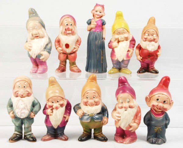Lot of 10: Snow White & the 7 Dwarfs Figures.: Description Includes Snow White and nine Dwarfs. Four figures are in pretty nice condition while the remainder have splitting, cracking, and denting. One figure has a hole through its chest. Condition