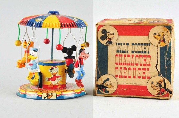 Tin Litho Linemar Character Carousel Wind-Up Toy.: Description Japanese. Working. Bright toy with nice colorful lithographed characters of Huey, Dewey, and Louie around base. When in operation, toy emits musical noise. Goofy's right ear is broken off 