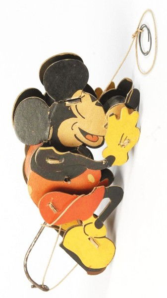 Cardboard Disney Mickey Mouse Climbing Toy.: Description Made by The Dolly Company and marked "Walt Disney Enterprises" on back. Toy is operated by pulling on rings attached to string. Original ears with some bending. Condition (Very Good). Size