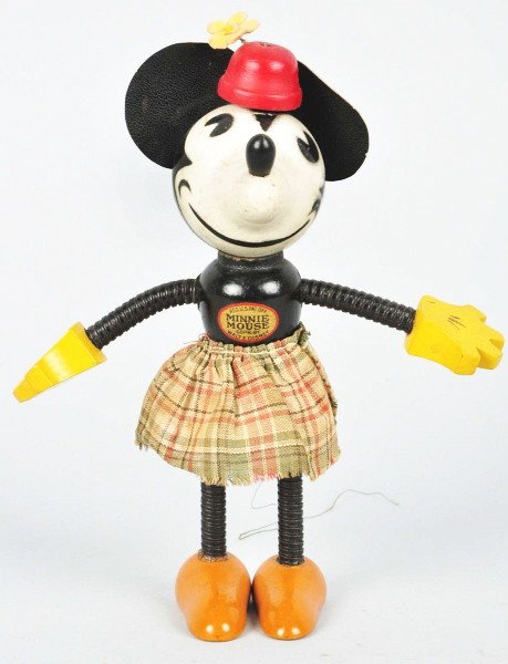 Disney Minnie Mouse Fun-E-Flex Figure.: Description Large size variation. Original ears, cloth skirt, tail, flower hat, and perfect decal on chest. Condition (Excellent). Size 7 - 1/2" T. Dimensions:7 - 1/2" T.