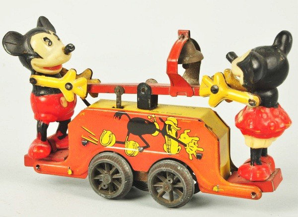 Tin Wells Mickey & Minnie Handcar Wind-Up Toy.: Description English. Working. Figures are hard later celluloid/early plastic. Marked "Made in England by Permission Walt Disney Mickey Mouse Ltd.". Some oxidation to original bare metal bell and some 
