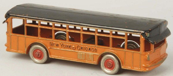 Cast Iron Dent Factory Sample Twin Motor Coach.: Description Rare. Orange painted body with black roof. Embossed "New York - Chicago" on sides. Detailed molding and nickel disc wheels with painted centers. Comes with Dent Hardware Co. sample tag #16