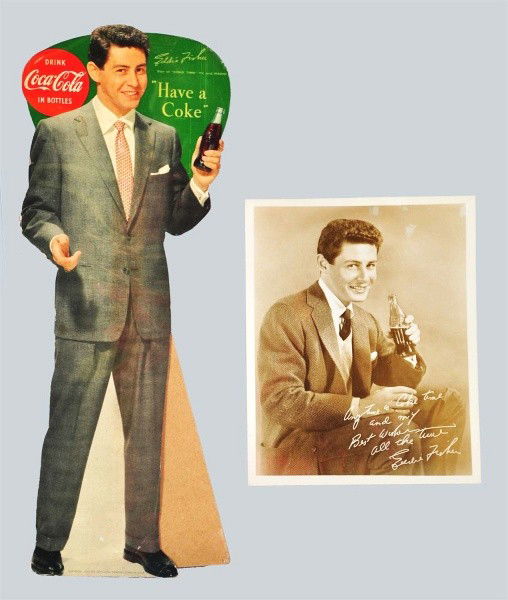 1954 Eddie Fisher Coca-Cola Cardboard Cut Out.: Description Nice small size, includes a nice photo of Eddie holding a bottle. Light wear and soiling, minor edge marks and wear, a few surface marks and stains. Condition (Very Good). Size Largest: 19