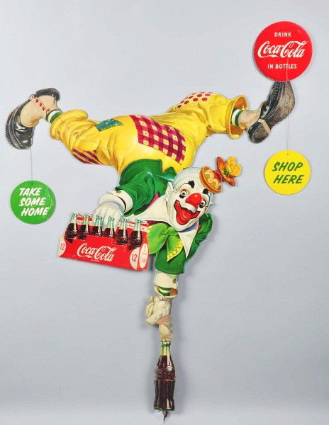 1954 Coca-Cola Two-Sided Clown Display.: Description Five pieces total. Legs slide into body, and bottle rod slides into the arm. Corrugated cardboard with bright color on both sides. Only minor surface marks and rubs, shallow depressions, a