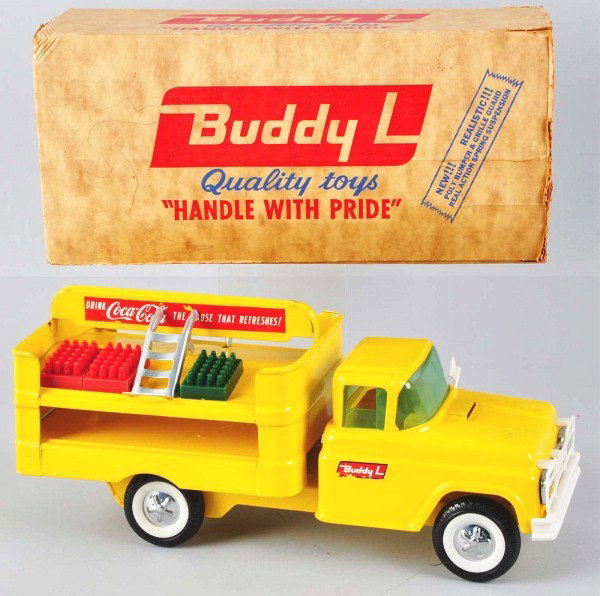 1960s - 70s Buddy L Coca-Cola Truck Toy with O/B: Description This version has the plastic bumper and grille guard. Very clean truck overall truck has two small rub areas on the hood. Includes original box with one flap loss to one end. Condition (Ex
