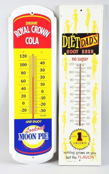 Lot of 2: Tin Soda Thermometers.: Description Includes a 1960s to 70s Dad's Root Beer, with only a few minor marks and border nicks. Also a 2003 RC Cola without flaws or wear. Condition (Near Mint). Size Each: 27" T. Dimensions:Each: 