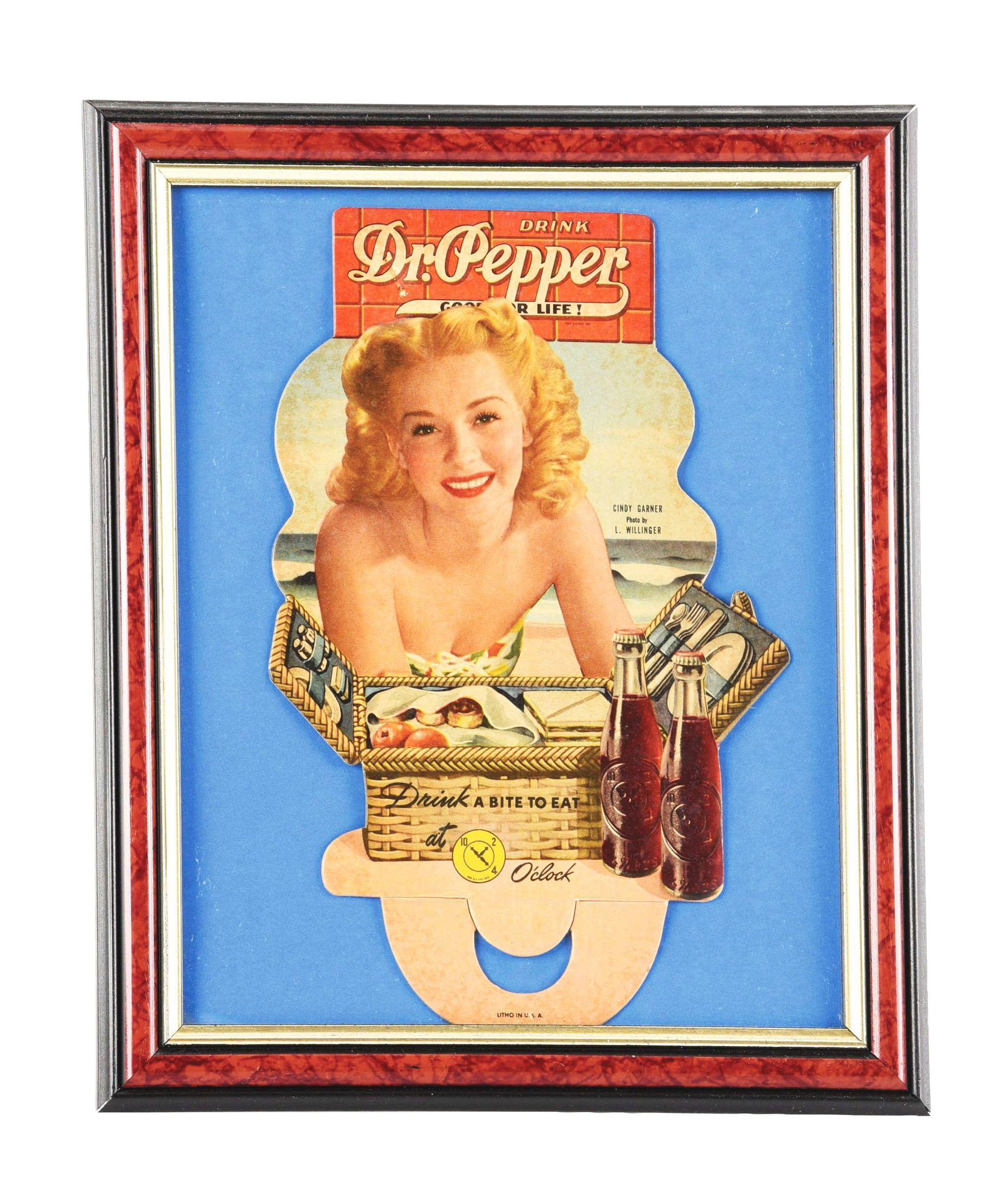 DR. PEPPER CARDBOARD LITHOGRAPH BOTTLE TOPPER.: This is a Dr. Pepper bottle topper featuring model Cindy Garner. It has a little bit of staining to the face of the piece, but it is overall new old stock, with a tiny bit of color fade and perhaps so
