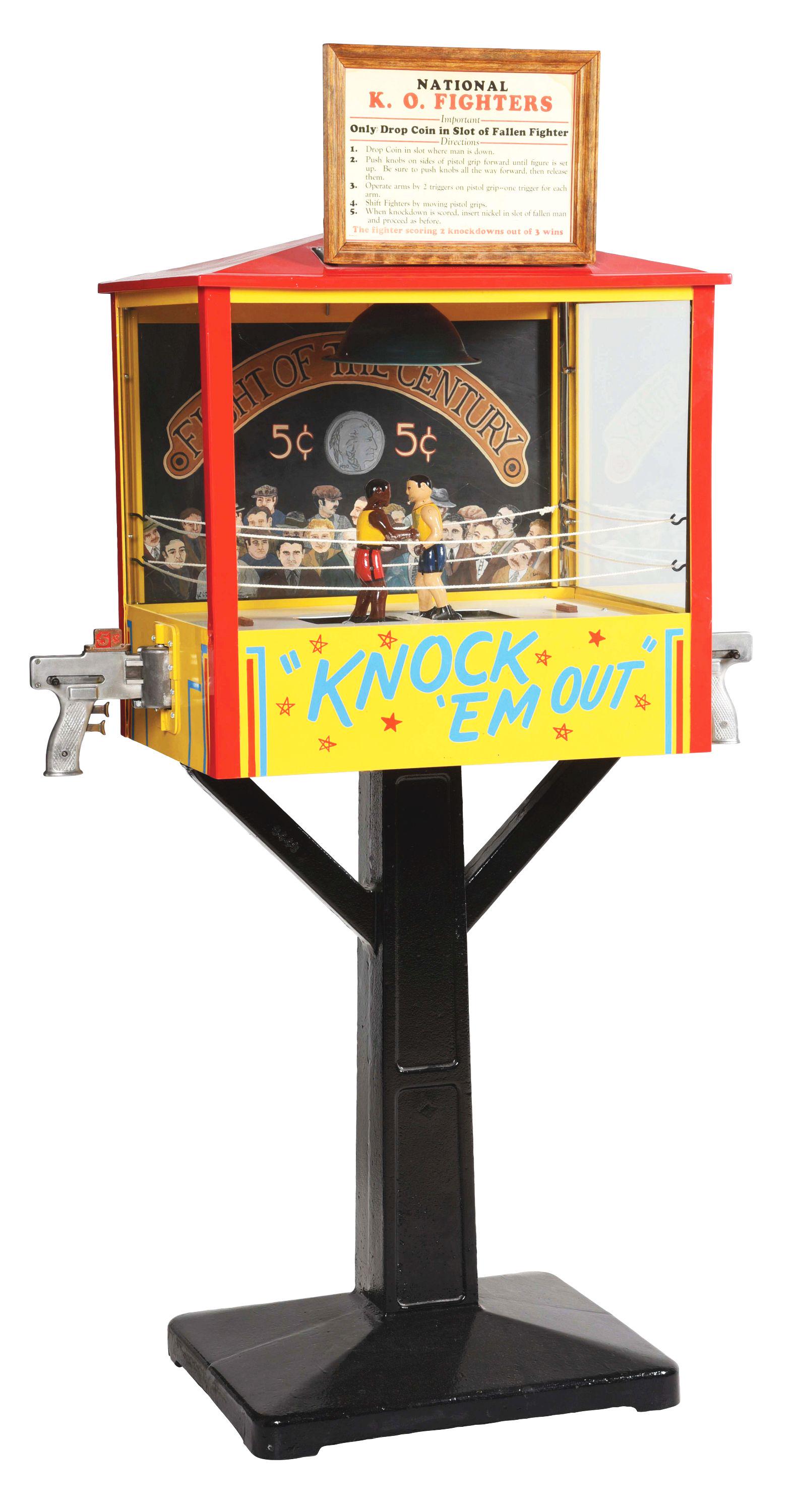 5¢ NATIONAL NOVELTY K.O. BOXER ARCADE GAME.: The first interactive boxing game of its kind, the K.O. Fighters offered players the chance to participate in boxing matches of their own. On either side of the cabinet are two pistols which control t