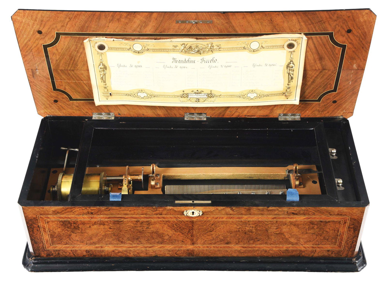 MANDOLINE PICCOLO MUSIC BOX.: A very nice rosewood inlaid cabinet with serial number 29388 bedplate with Mandoline Piccolo movement and comb. Working and no missing teeth or repairs. Slight bow to the box lid. Comes without a cyli