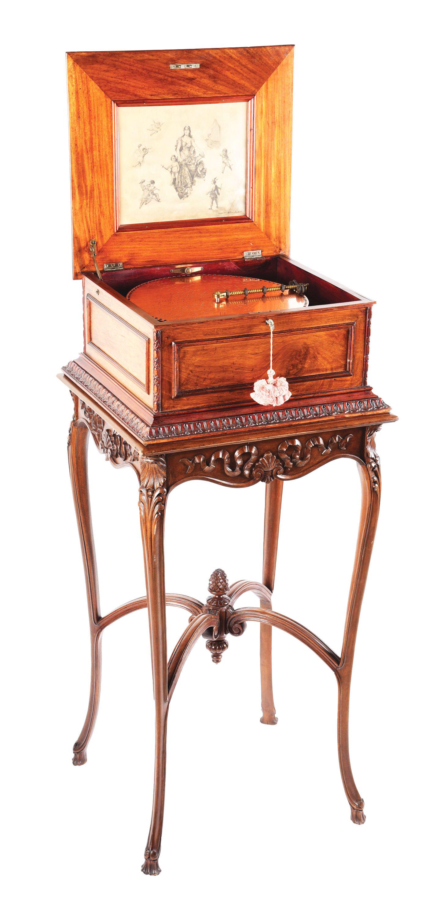 REGINA MUSIC BOX WITH STAND AND DISCS. (1 of 15)