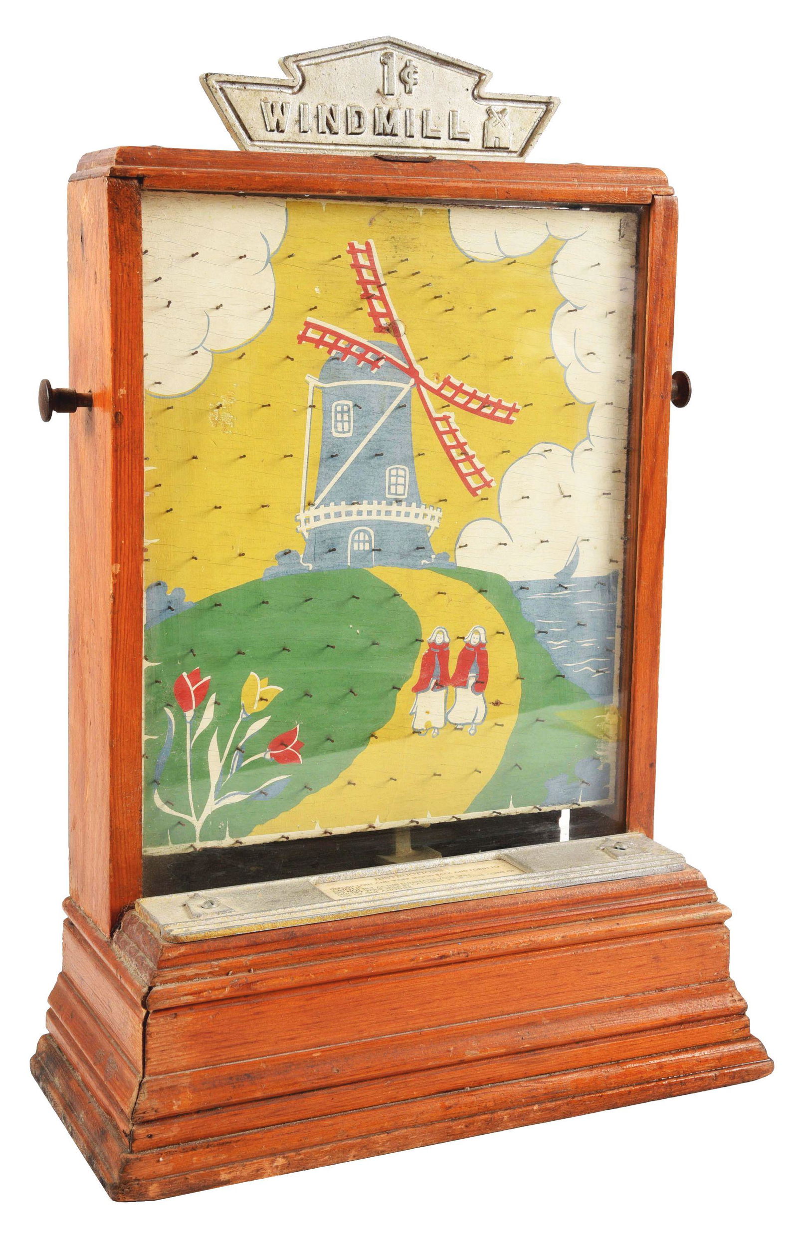 1¢ STANDARD GAMES WINDMILL COIN DROP TRADE STIMULATOR.: This post-war coin drop game is in original condition and has a coin catcher for the player to use. The wood cabinet and graphics in the pin field are in beautiful condition. Signs of wear and use. C.
