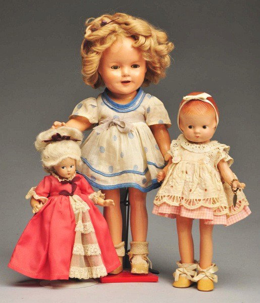 Lot of 3: American Composition Dolls.: Effanbee "Patsyette" with molded hair, brown side-glancing eyes (overall crazing, arm replaced), metal heart bracelet, redressed; rare Alexander "Colonial" girl (light overall crazing), totally origin