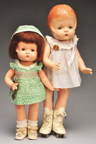 Lot of 2: Effanbee Composition Dolls.: All composition and fully marked. "Patsy" with human hair wig over molded hair, perfect lashed sleeping eyes (arms refinished), vintage green cotton dress and hat, shoes and socks. "Patsy Joan" with m