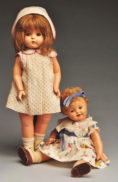 Lot of 2: Effanbee Composition Dolls.: Patsy Ann" body with Lovums tousle head (original factory combination), original caracul wig, sleeping eyes (crackled lashes missing, overall crazing), open mouth with upper and lower teeth, vintage c