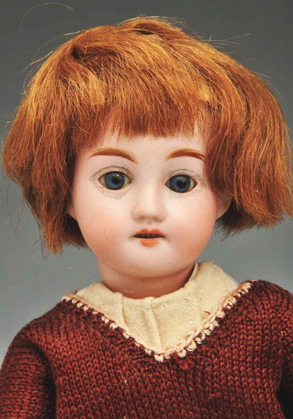 Bleuette Type Doll.: Bisque head child doll on fully jointed French wood and composition body, head incised "8/0", wearing a Gautier-Languereau sport dress and sweater with 1920s Kneipp sandals. Identified as a Bleuette d