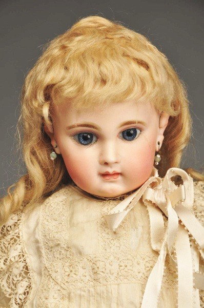 French Bisque Bébé Doll.: Early bisque socket head incised 8 over EJ made by Jumeau (head broken in four pieces and glued back together, not a professional repair), soft multi-stroked eyebrows, molded upper eyelids, blue threa