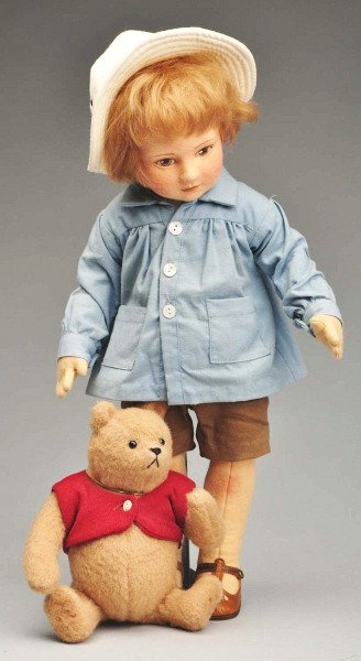 Set of "Christopher Robin and Winnie-the-Pooh".: By R. John Wright, #539 of a limited edition of 2500. Both are all original with labels; light dust overall and some loss to fur in Pooh's legs. Size: 18" T.