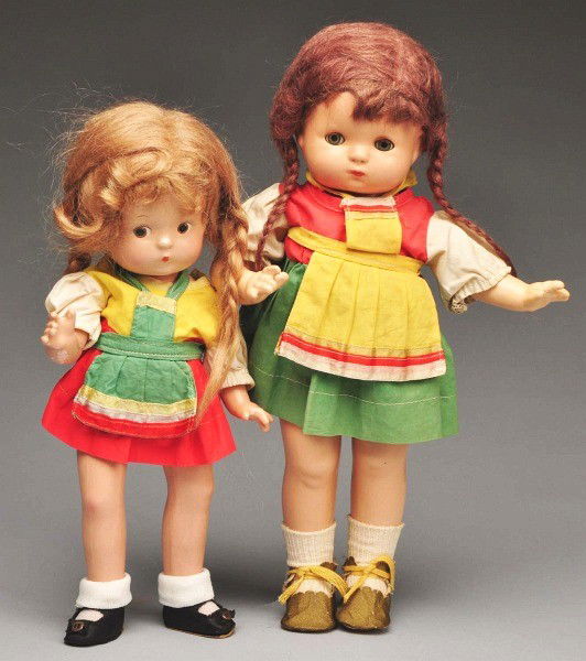 Lot of 2: Effanbee Composition Dolls.: All composition dolls in costumes from "White Horse Inn," a Broadway hit play of the 1930s. One has Patsy Baby head on Patsy body, original factory combination, mohair braids, blue sleeping eyes, all