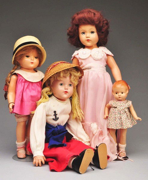 Lot of 4: Effanbee Composition Girls.: Little Lady" with clear brown mohair wig and lashed blue sleeping eyes, all factory original gown, undies, shoes and socks (light overall crazing); "Little Lady" 1940s wartime doll with yellow yarn ha