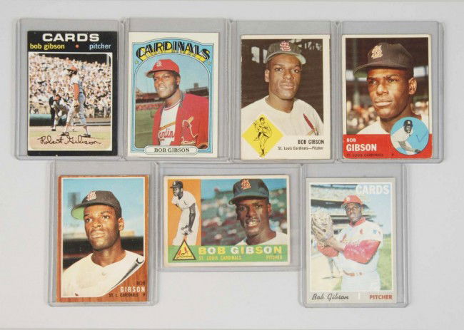 Lot of 7: Bob Gibson Baseball Cards.: Includes 1960, 1962, 1963, 1970, 1971, and 1972 Topps cards and 1963 Fleer card. Nicest card is a very well centered and sharp 1970. The 1963 has a line crease from top to bottom. Condition: (Very Goo