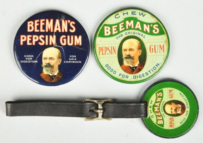 Lot of 3: Beeman's Gum Items.: Includes one blue pocket mirror with cracking and silvering, one green pocket mirror with some foxing around edges, and one watch fob. Size: Largest: 2 - 1/16" Dia. Condition: (Good - Excellent).