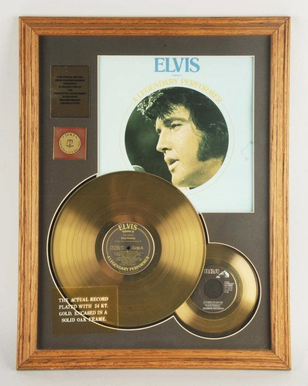 Framed Elvis Gold-Plated Record No. 36.: Matted and framed under glass. Only 1000 were made. Size: Framed: 27" x 20 - 3/4". Condition: (Excellent).