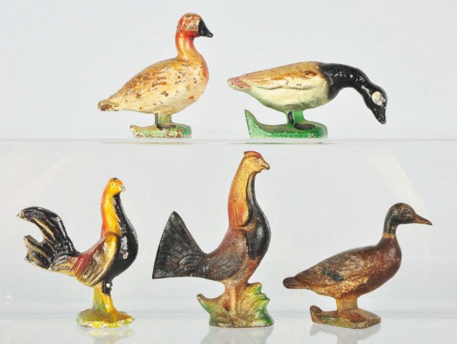 Lot of 5: Cast Iron Bottle Openers.: Manufactured by John Wright and Wilton. Includes two chickens, two ducks, and one Canadian goose. Size: Largest: 4" T. Condition: (Very Good).