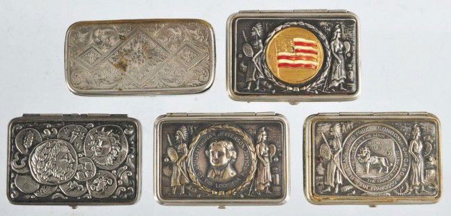Lot of 5: Match Safes.: Includes one with an Indian and Thomas Jefferson on front, one with a grouping of Gemini figures, one with an American flag and Indian, one with a lion and Indian figure advertising International Tail