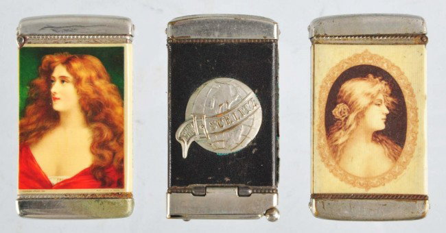 Lot of 3: Advertising Match Safes.: Includes one Schlitz Beer with leather encasing and cigar cutter, one depicting a pretty lady advertising Andreas & Hauck Limited Clothiers Merchants and Tailors with celluloid wrapping, and one Berge