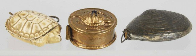 Lot of 3: Metal Figural Sewing Tape Measures.: Includes one clam shell, one with 3D turtle on top, and one rare turtle with wind-up tape. Size: Largest: 2 - 3/8" L. Condition: (Excellent).