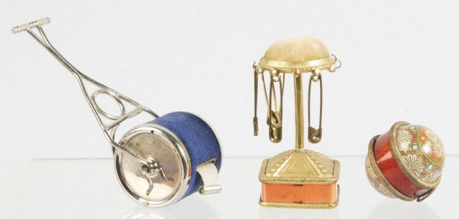 Lot of 3: Metal Figural Sewing Tape Measures.: Includes one wind-up metal roller, one with clips to hold jewelry, and one ball. All with full tape measures. Size: Largset: 3 - 3/4" L. Condition: (Excellent).