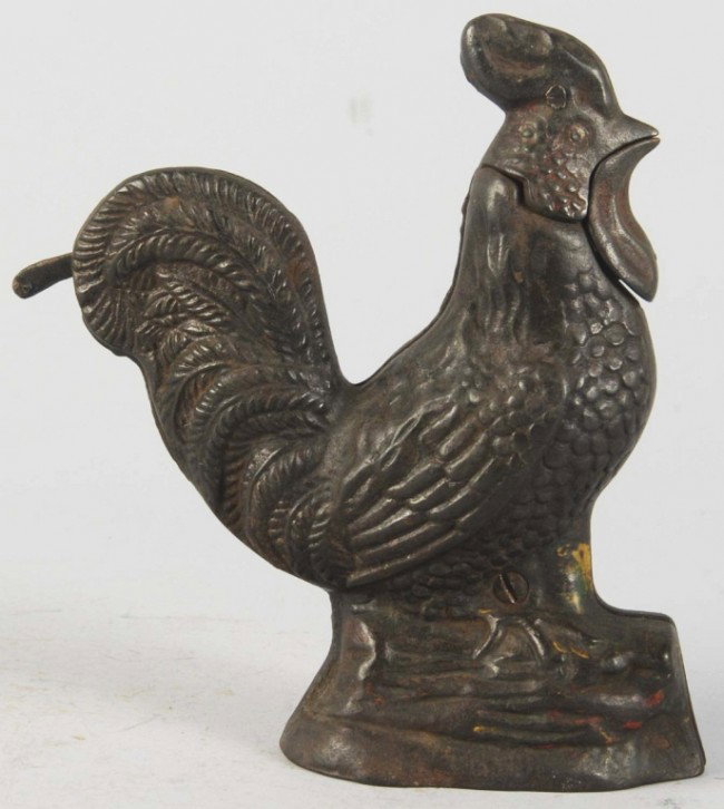 Cast Iron Rooster Mechanical Bank.: Manufactured by Kyser & Rex. Working. Very dirty. Size: 6 - 1/4" T. Condition: (Very Good). CORRECTION – Replaced lever but working. Very dirty. New estimate $100 - $200.