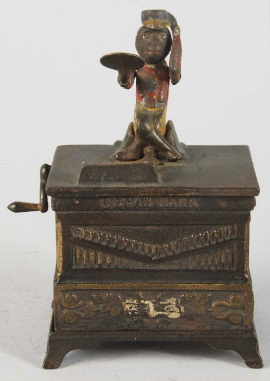 Cast Iron Organ Mechanical Bank.: Manufactured by Kyser & Rex. Medium size variation. Working. Size: 6 - 1/4" T. Condition: (Good - Very Good).