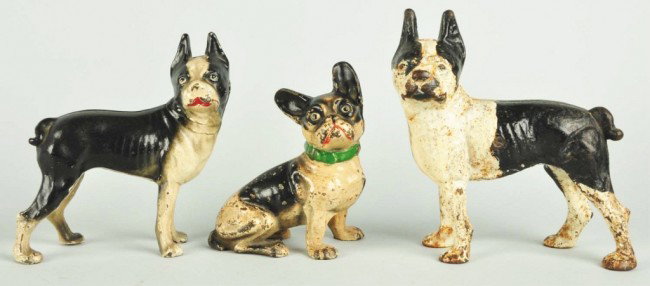 Lot of 3: Cast Iron Dog Doorstops.: Includes two Boston Terriers (one facing left is repainted) and one French Bulldog. Size: Largest: 10" T. Condition: (Very Good).